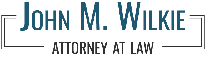 John M. Wilkie Attorney at Law logo